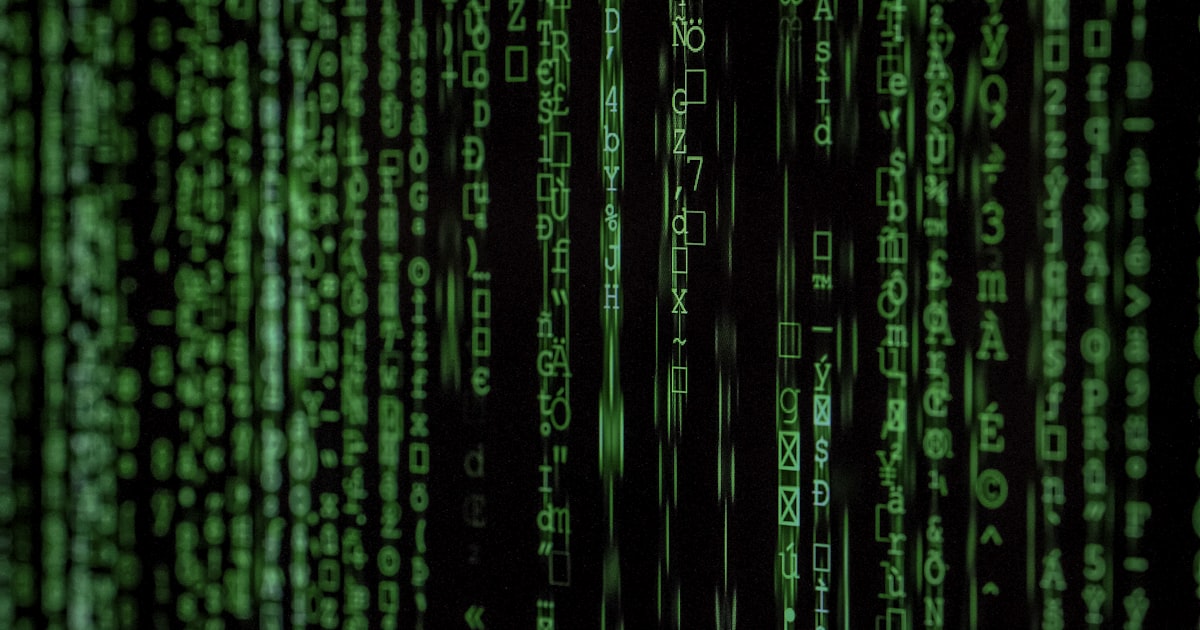 Computer terminal displaying green code on a dark screen representing system administration